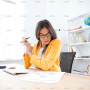businesswoman-analysing-document-P8WSNMC-1.png