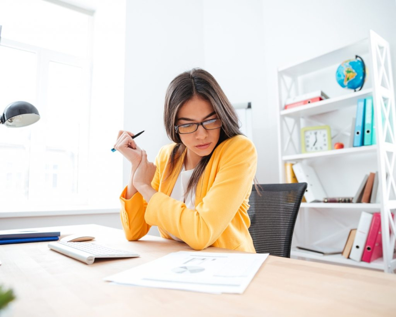 businesswoman-analysing-document-P8WSNMC-1024x820